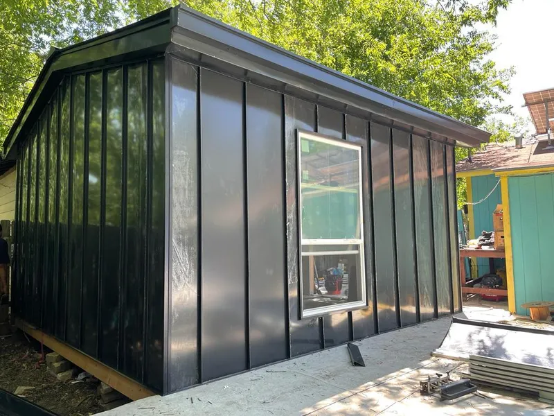 Black standing seam metal wall panels for Metal Roof Installation in Asheville