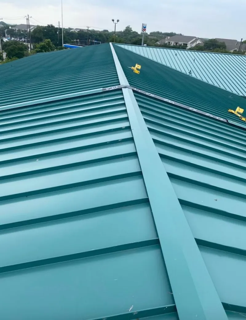 Green commercial metal roof ridge and valley for Metal Roof Repair in Asheville
